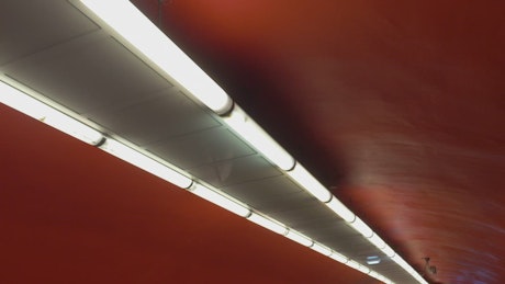 Lamps along a tunnel.