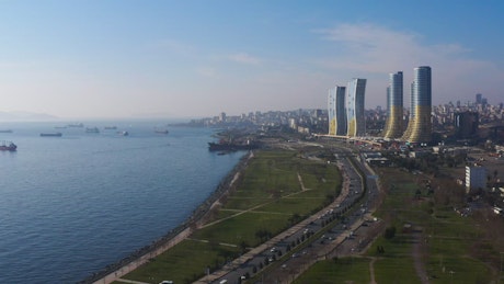 Landscape of a city on a coast in an aerial shot.