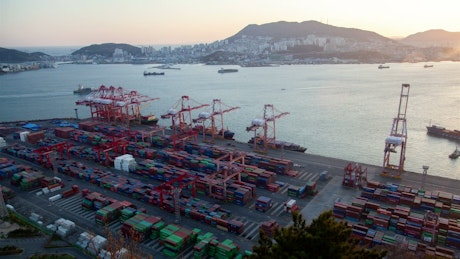 Large container area on a cargo ship shoreline.