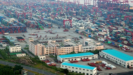 Large container area on a coastline, aerial shot.