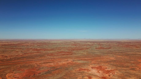 Large desert on a sunny day in an aerial view.