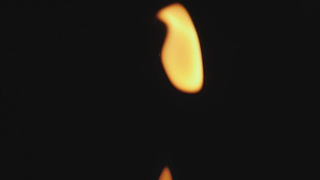 Loop of a flame giving off fire
