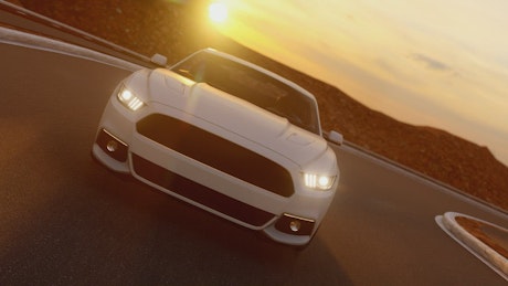 Luxury white sports car in the highway at sunset.