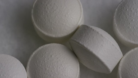 Macro shot of white compressed pills