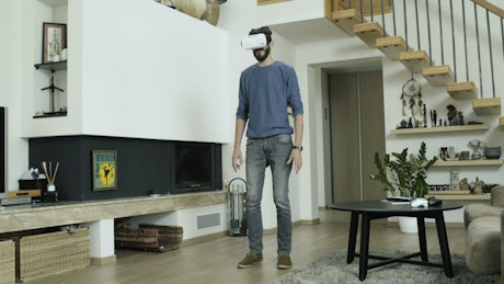 Man dancing with VR glasses.