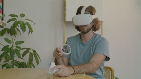 Man interacting with virtual reality.