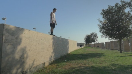 Man jumping from a wall