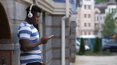 Man listening to music on his phone