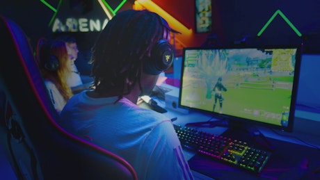 Man playing online with his friends.