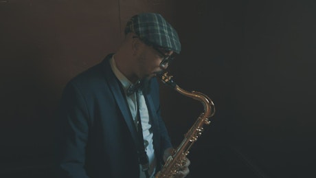 Man playing the saxophone.