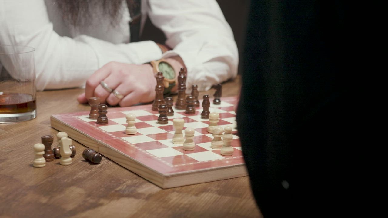 A chess player making his next chess move, Stock image