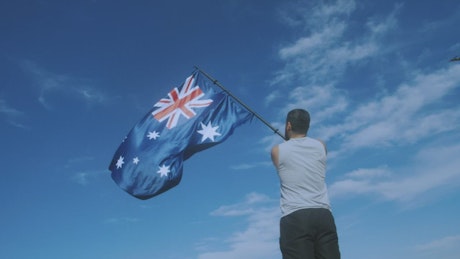 Man waving an Australian flag