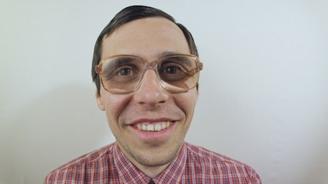 Man with glasses surprised, portrait.