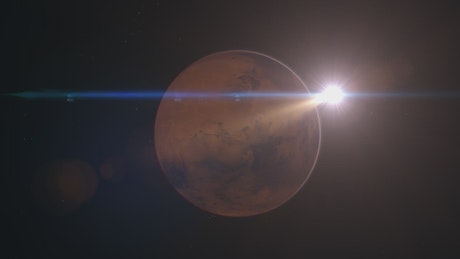 Mars rotating in space around sun.