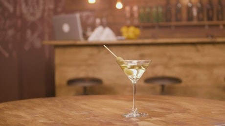 Martini on a bar table.