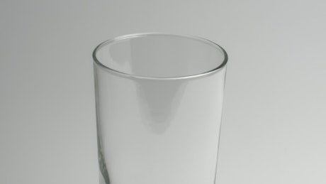 Milk poured into a transparent glass
