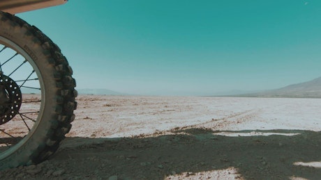 Motorcycle tire speeding in the desert
