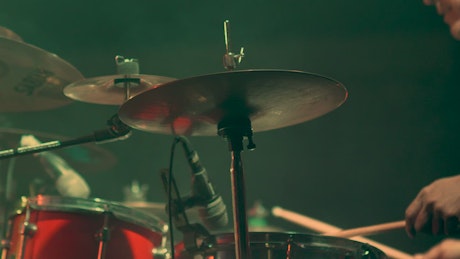 Musician playing drums on stage