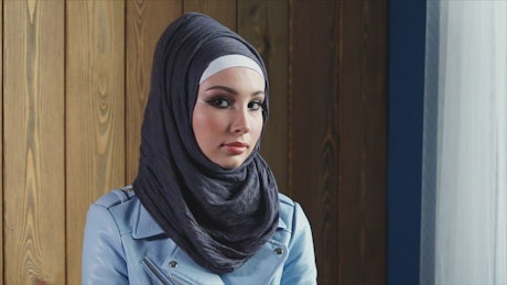 Muslim girl posing for camera.