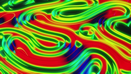 Neon colored ribbons move in a hypnotic pattern.
