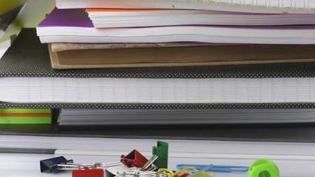 Notebooks and pens of a student