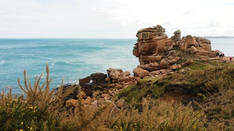 Ocean coast with rocky cliffs.