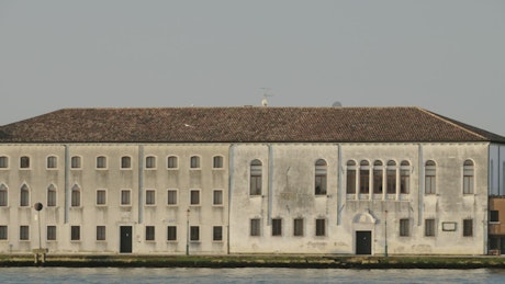 Old buildings by the water in Venice.