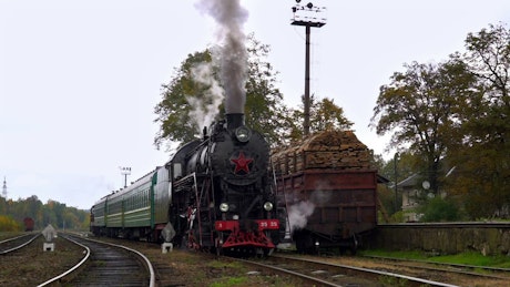 Old steam train starts to move