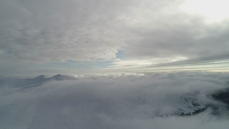 Panorama of a misty cold landscape on a cloudy day.