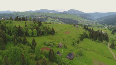 Panoramic aerial shot of a mountain village.