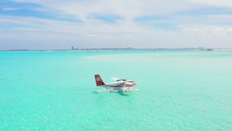 Paradise beach with a water plane.