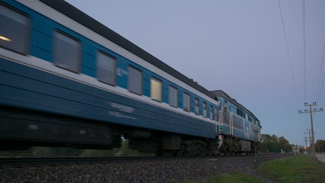 Passenger train passing by slowly
