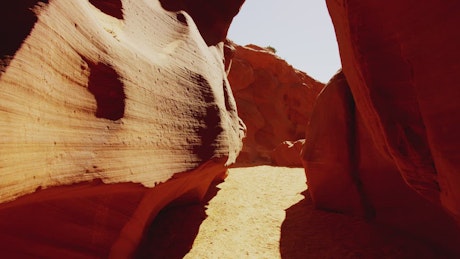 Passing between rock formations in the desert