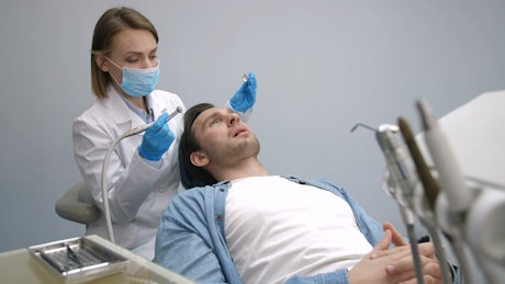 Patient having their teeth cleaned