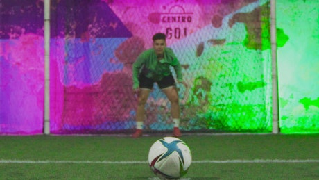 Penalty kick during a football match.