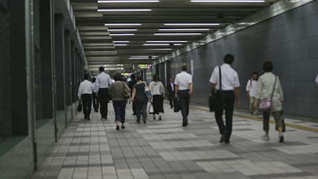 People in the subway hall in Tokyo.