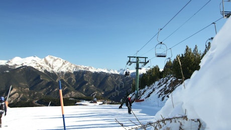 People skiing on the mountain.