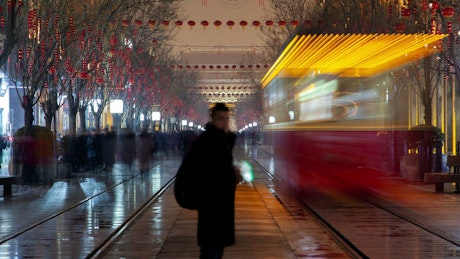 People walking in fast motion in a Beijing street