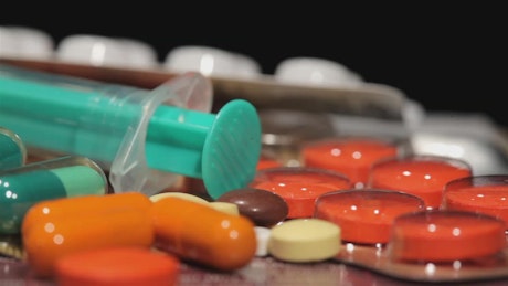 Pharmacy drugs and pills in closeup.