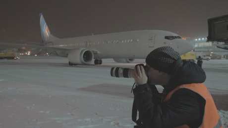 Photographer at an airport.