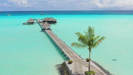 Pier on the shore of the turquoise sea.