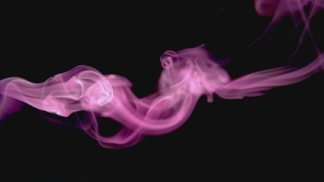 Pink smoke swirls and expands.