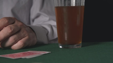 Placing chips on a Poker table.