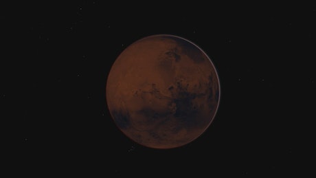 Planet Mars rotating gracefully in Space.