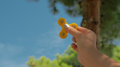 Playing with a Fidget Spinner