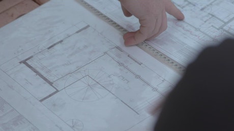 Pointing to blueprints.