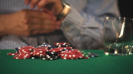 Poker player betting everything.