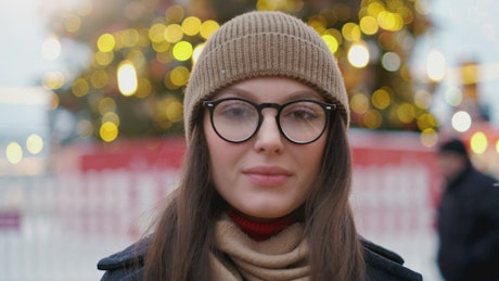Portrait of a woman with glasses at winter