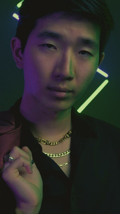 Portrait of a young Asian mobster.