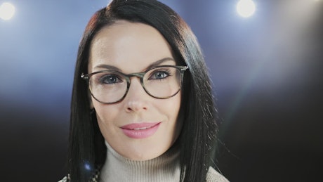 Portrait of an adult white woman with black hair.